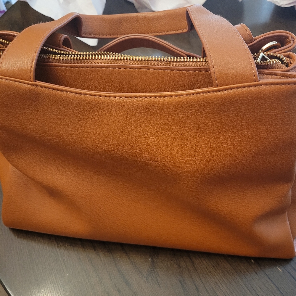 a. new day Handbag
